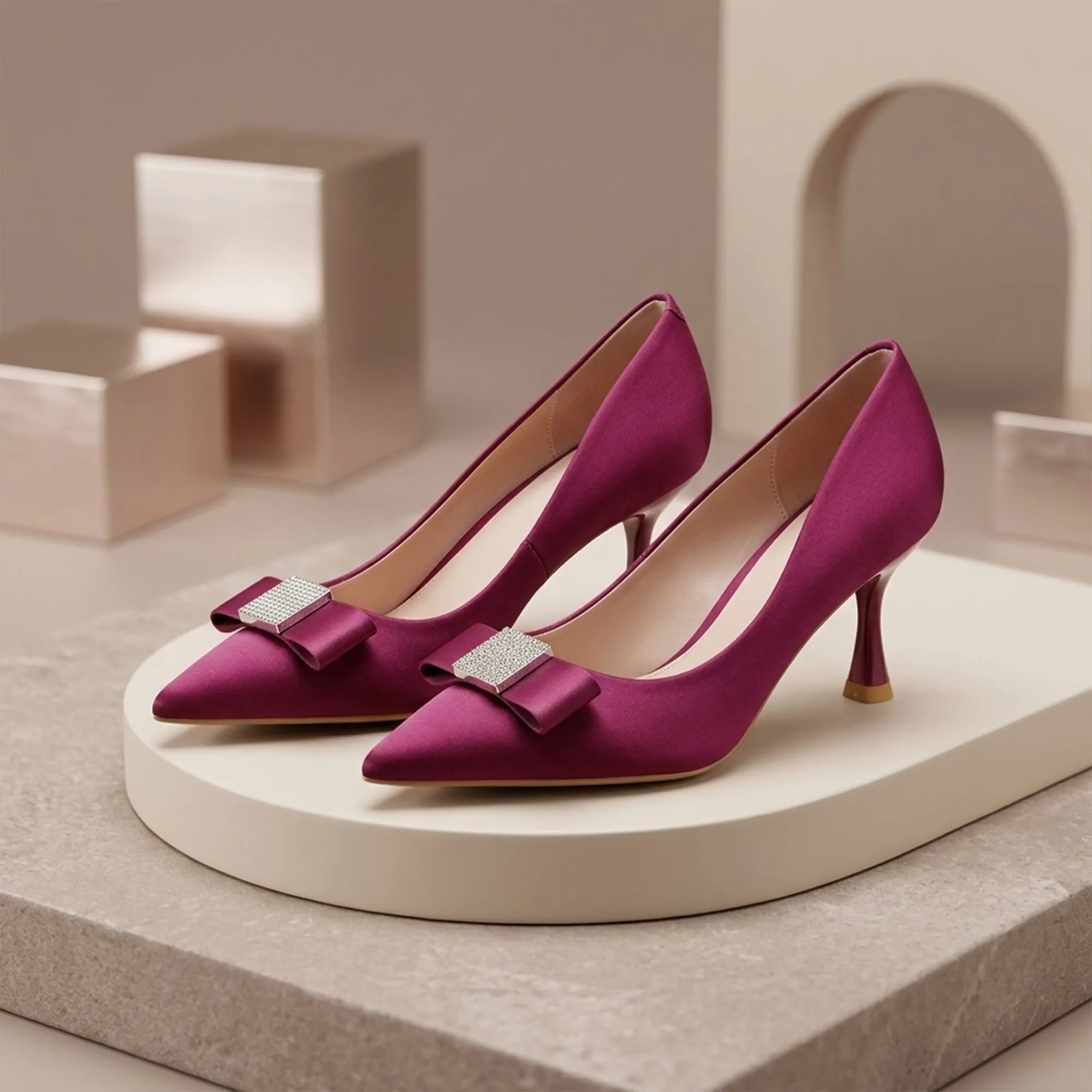 Magenta-satin-pointed-toe-heels-for-women-with-bow-embellishment-and-kitten-heel-design