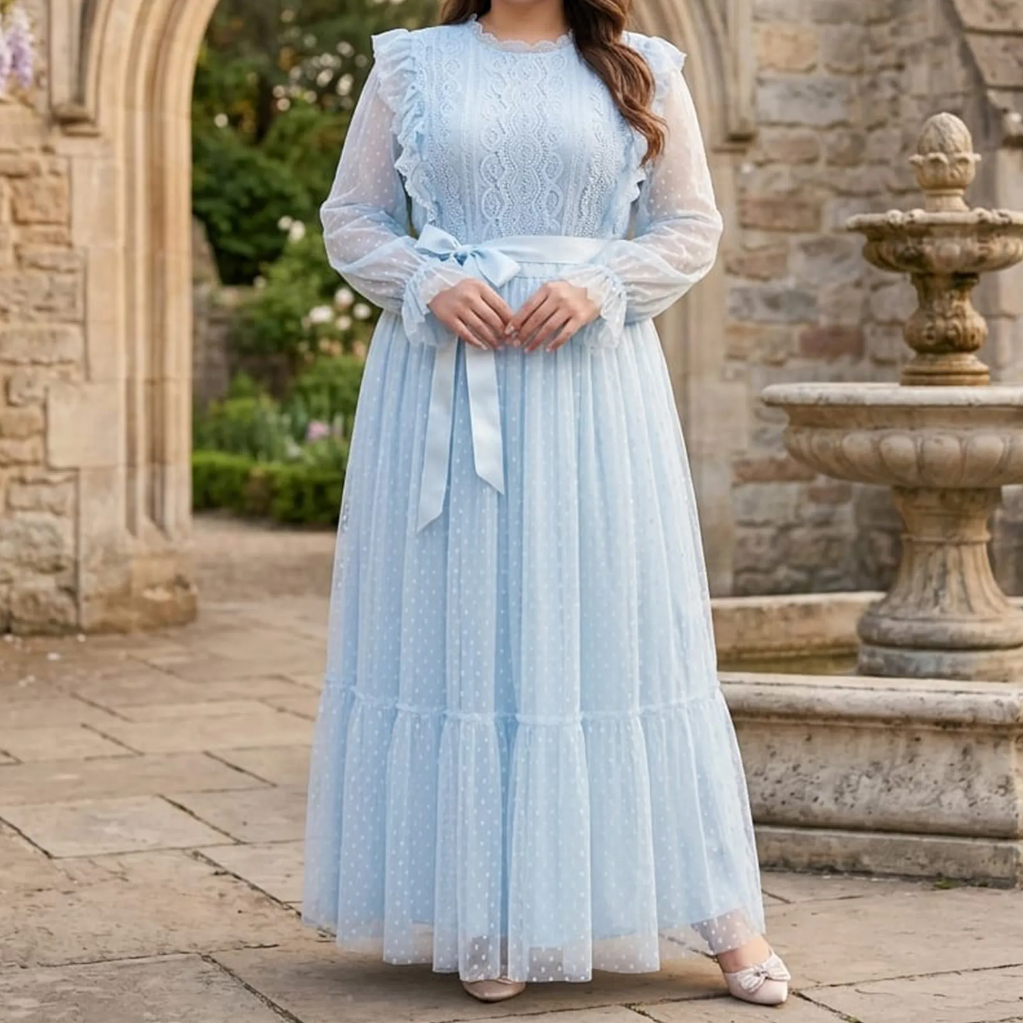 Sky-blue-lace-maxi-dress-for-women-with-long-sheer-sleeves-ruffle-details-and-satin-waist-belt