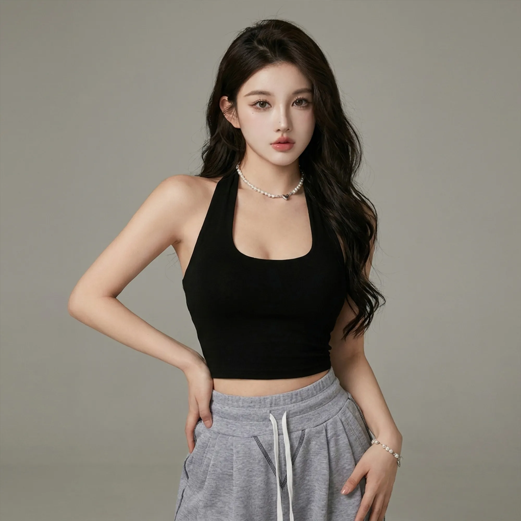 Black-halter-neck-sleeveless-crop-top-for-women-with-slim-fit-and-square-neck-design