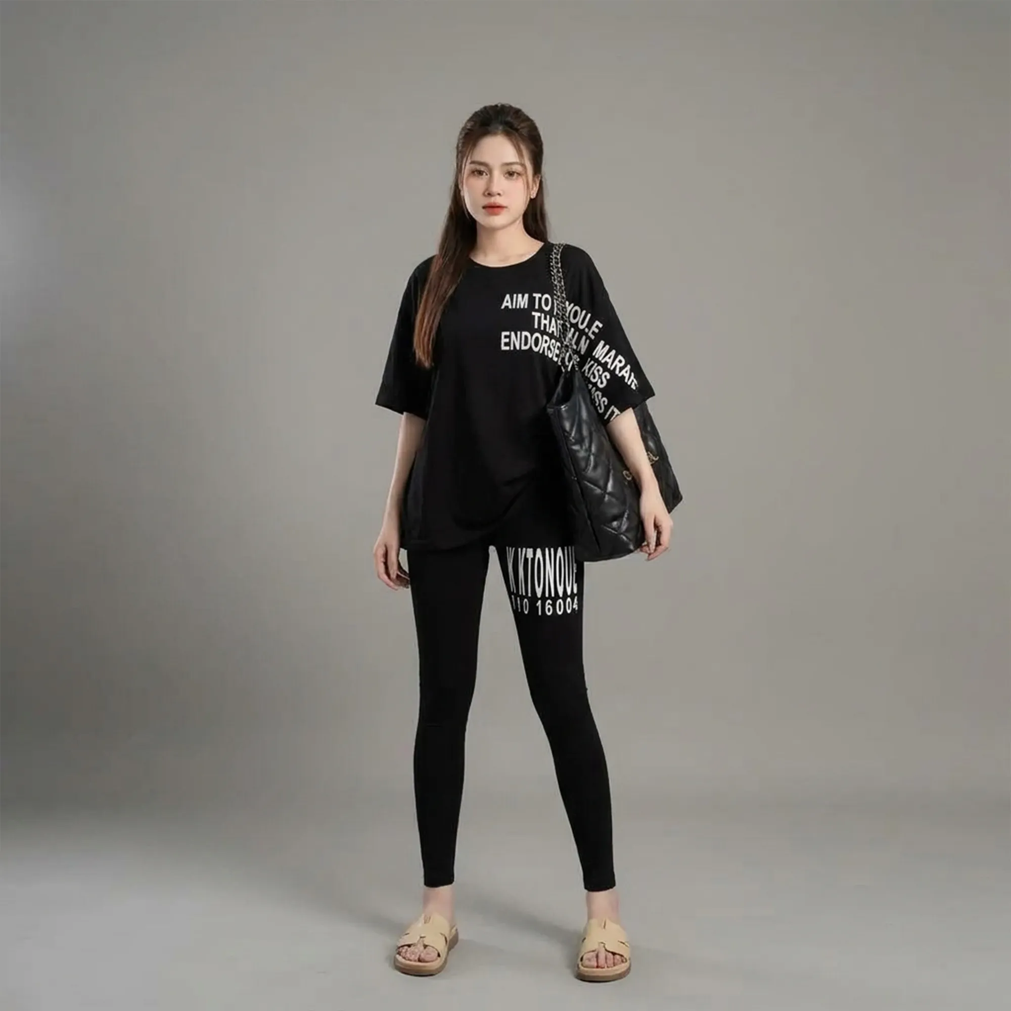 Black-printed-oversized-co-ord-set-for-women-with-graphic-t-shirt-and-slim-fit-leggings