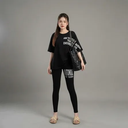 Black-printed-oversized-co-ord-set-for-women-with-graphic-t-shirt-and-slim-fit-leggings