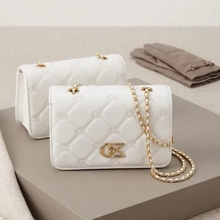 White-quilted-chain-sling-bag-with-gold-metal-detail-for-women