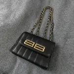Black-quilted-faux-leather-chain-sling-bag-with-gold-clasp-for-women