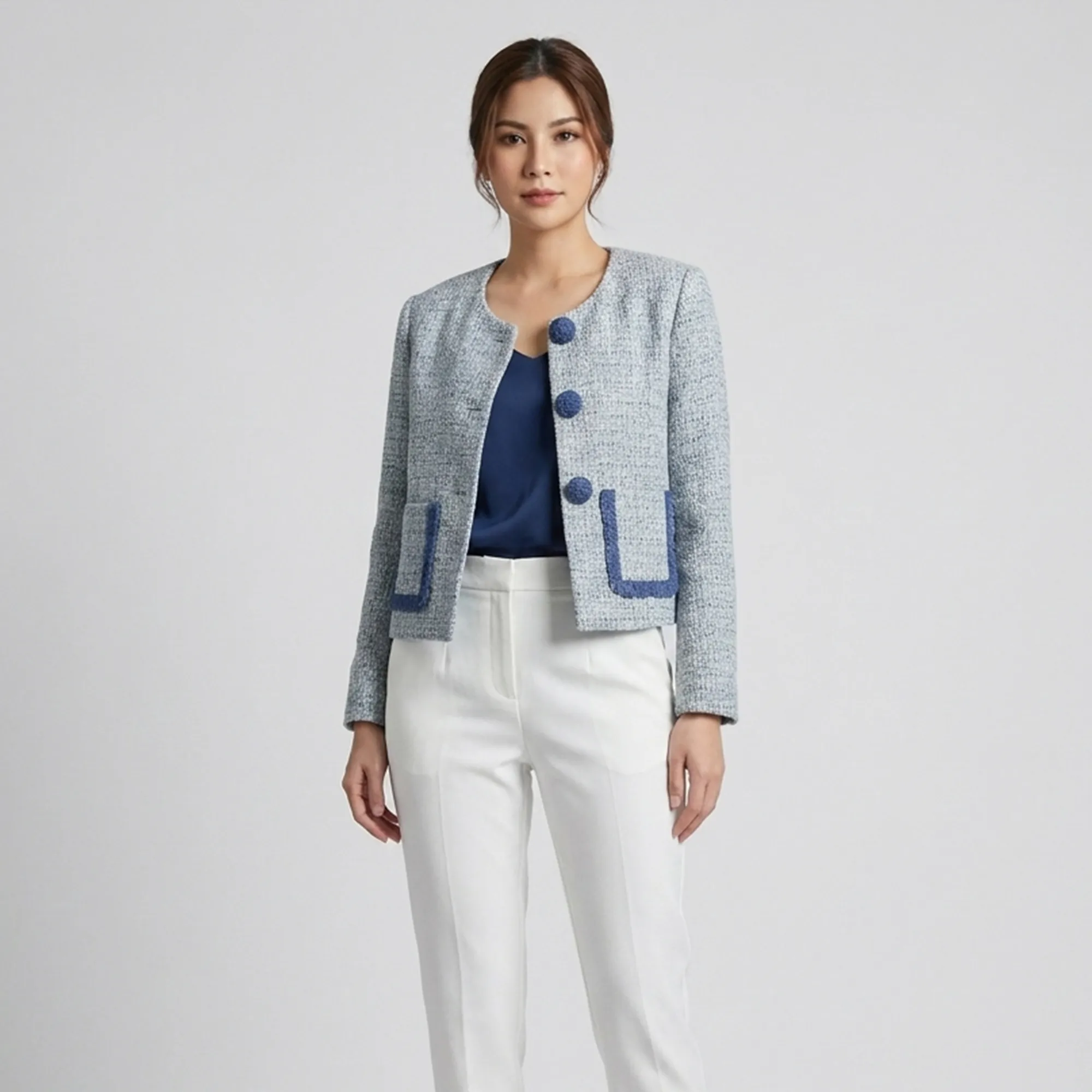 Light-blue-tweed-collarless-button-front-full-sleeve-jacket-with-navy-trim-for-women
