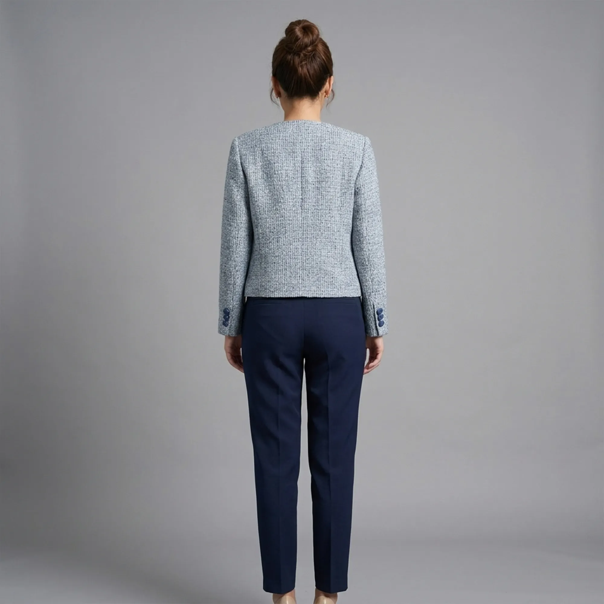 Light-blue-tweed-collarless-button-front-full-sleeve-jacket-with-navy-trim-for-women