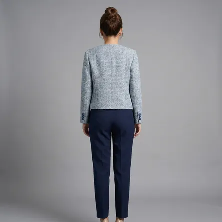 Light-blue-tweed-collarless-button-front-full-sleeve-jacket-with-navy-trim-for-women