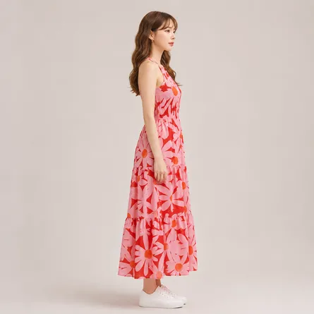 Pink-floral-halter-neck-tiered-maxi-dress-for-women-with-cross-back-straps-and-oversized-floral-print