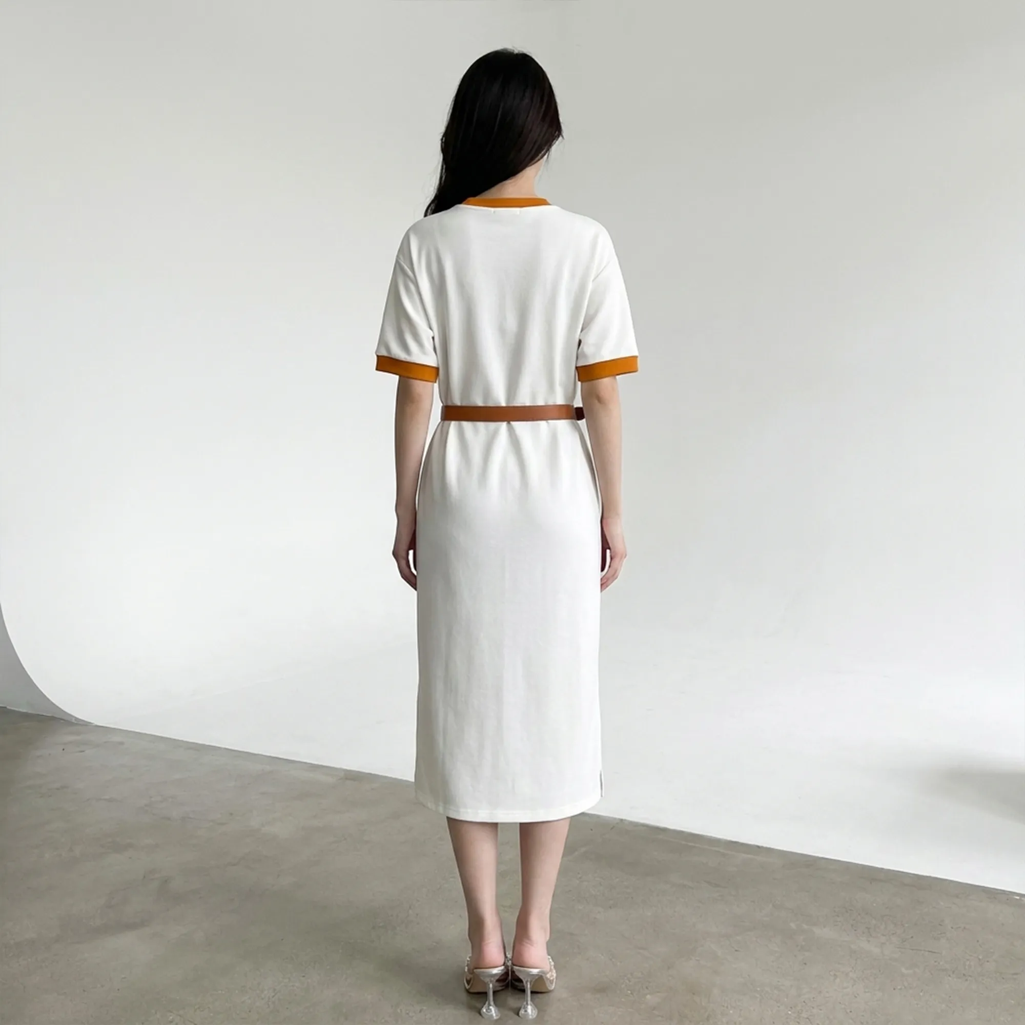 White-contrast-trim-round-neck-half-sleeve-belted-midi-t-shirt-dress-for-women-with-side-slit-and-logo-applique