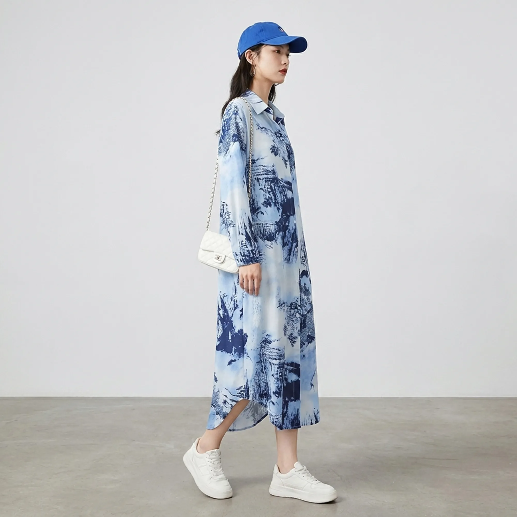 Blue-abstract-print-long-sleeve-button-down-midi-shirt-dress-for-women-with-collared-neck-and-relaxed-fit