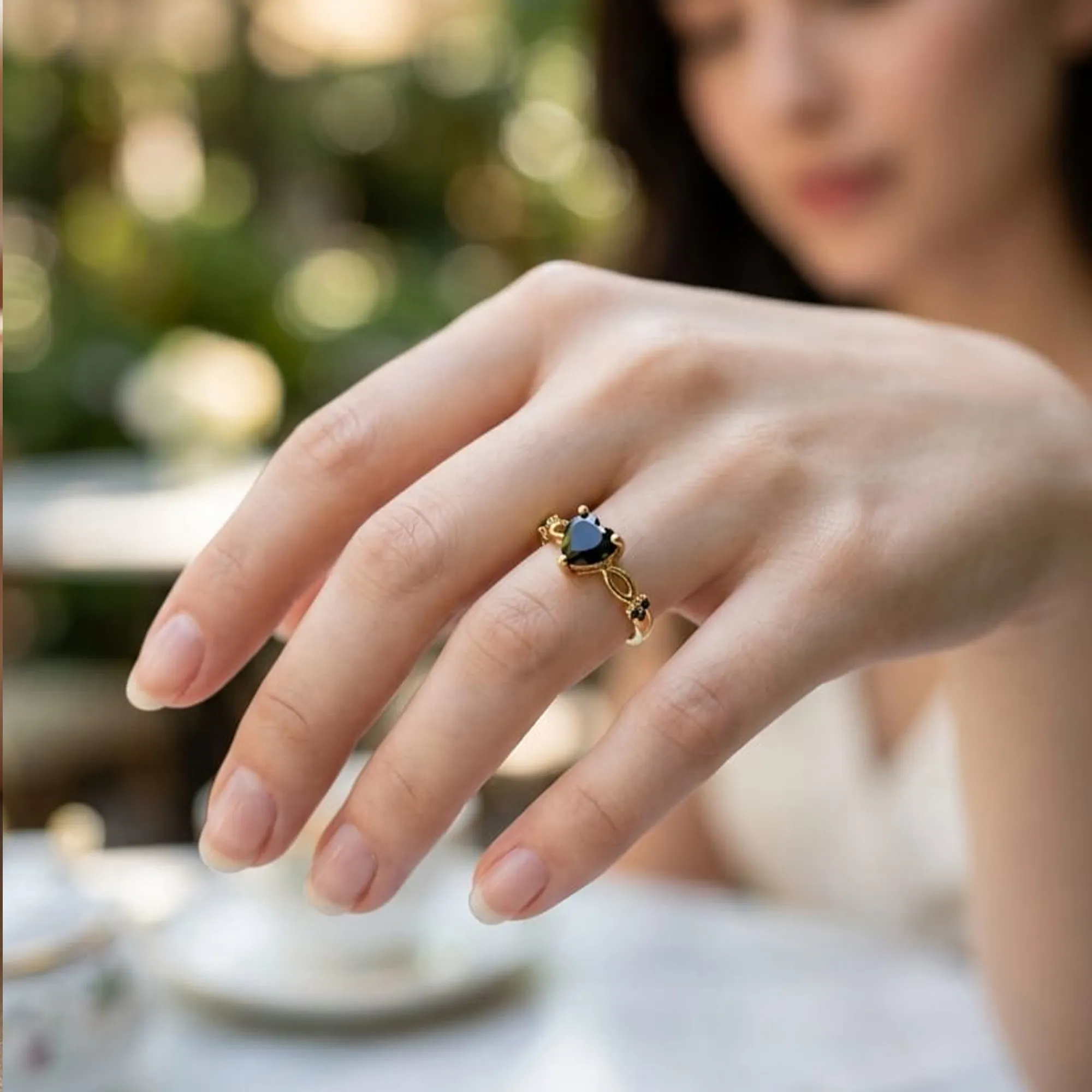 Gold-tone-black-heart-gemstone-infinity-ring-for-women