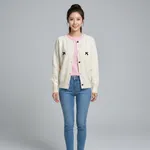 Cream-knit-button-front-cardigan-sweater-for-women-with-black-bow-details-and-full-sleeves