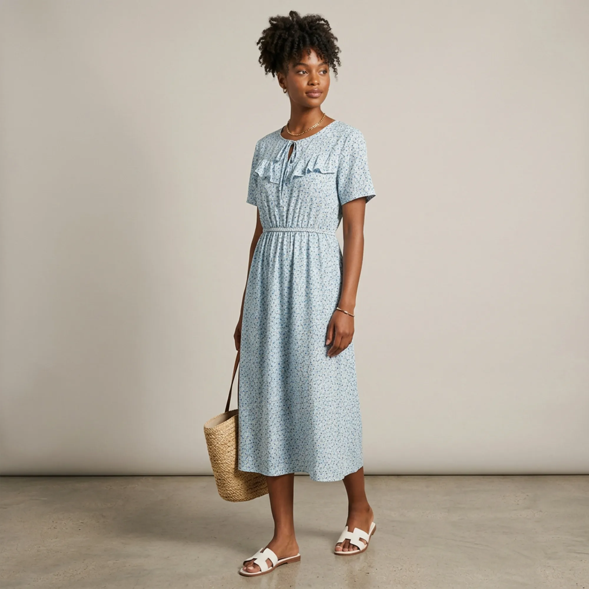 Light-blue-floral-printed-midi-dress-with-ruffle-detail-and-short-sleeves