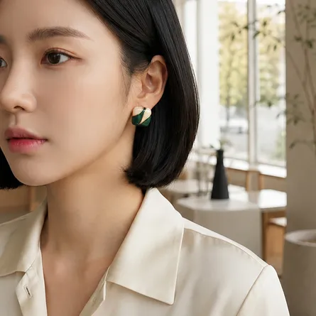 Dark-green-and-cream-geometric-statement-earrings-with-gold-tone-detail-for-women