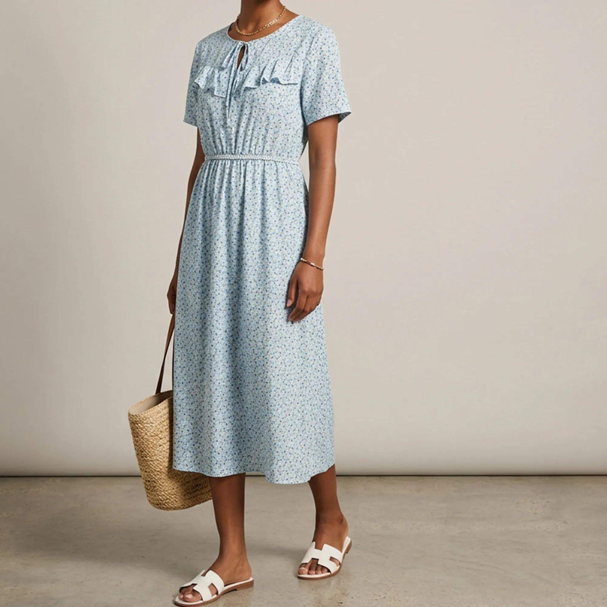 Light-blue-floral-printed-midi-dress-with-ruffle-detail-and-short-sleeves