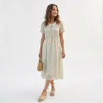 Beige-floral-midi-dress-with-peter-pan-collar-and-short-sleeves