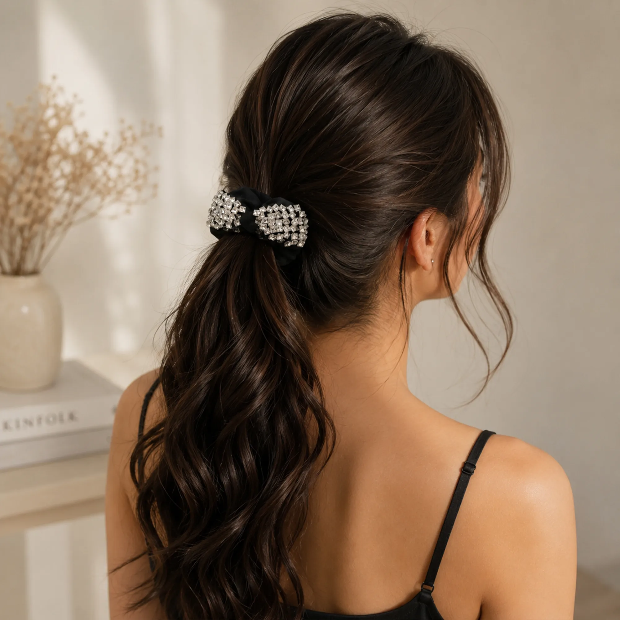 Black-satin-scrunchie-with-silver-crystal-embellished-bow-hair-accessory