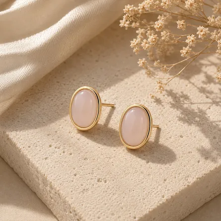 Pink-oval-gold-tone-stud-earrings-for-women