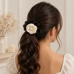Black-scrunchie-with-cream-pearl-flower-embellishment-hair-accessory
