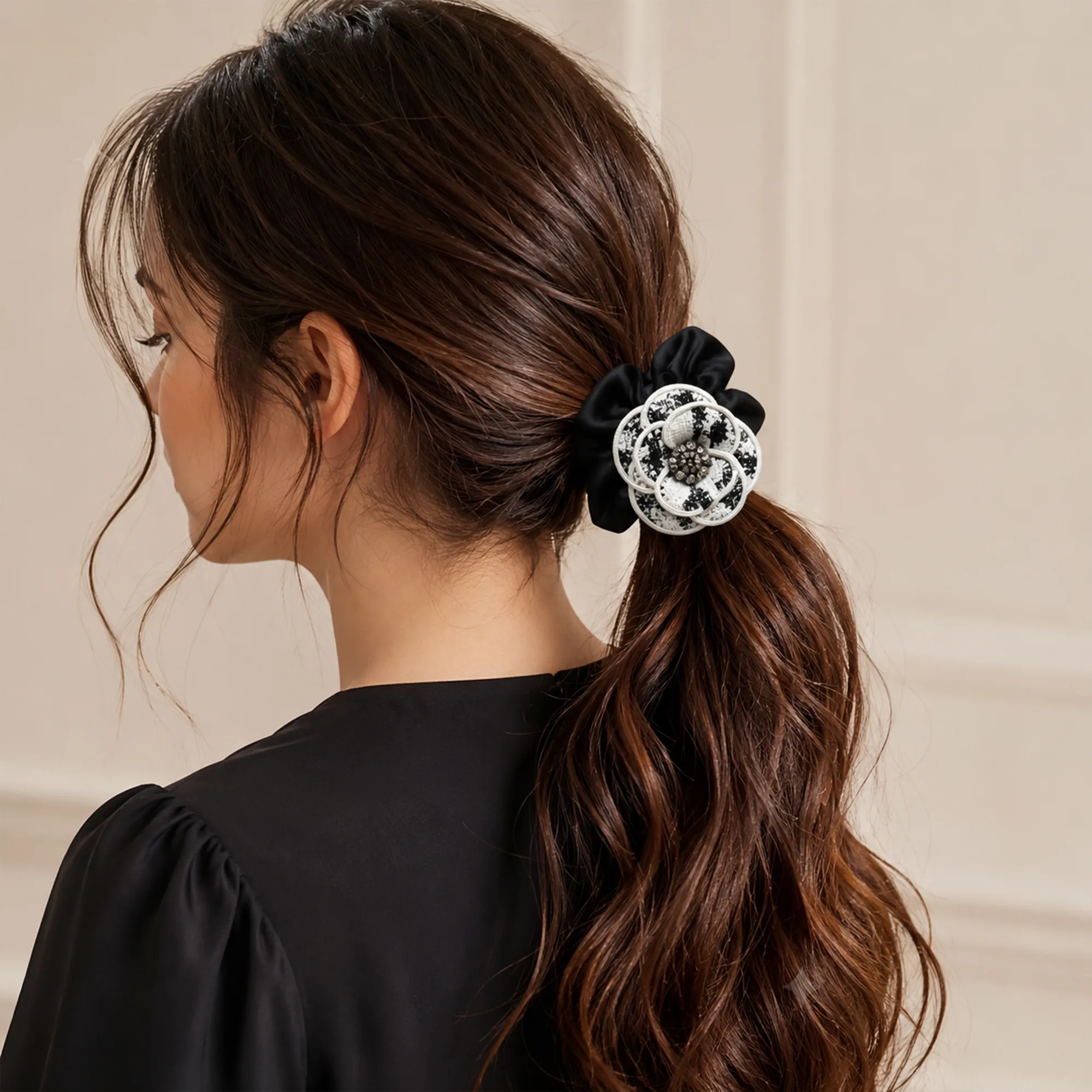 Black-scrunchie-with-black-and-white-floral-embellishment-and-beaded-center