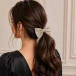 Black-scrunchie-with-silver-rhinestone-embellished-bow-hair-accessory