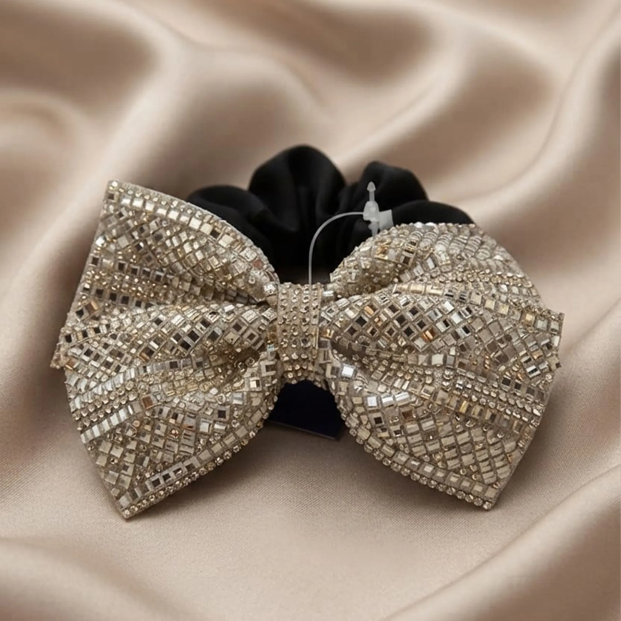 Black-scrunchie-with-silver-rhinestone-embellished-bow-hair-accessory
