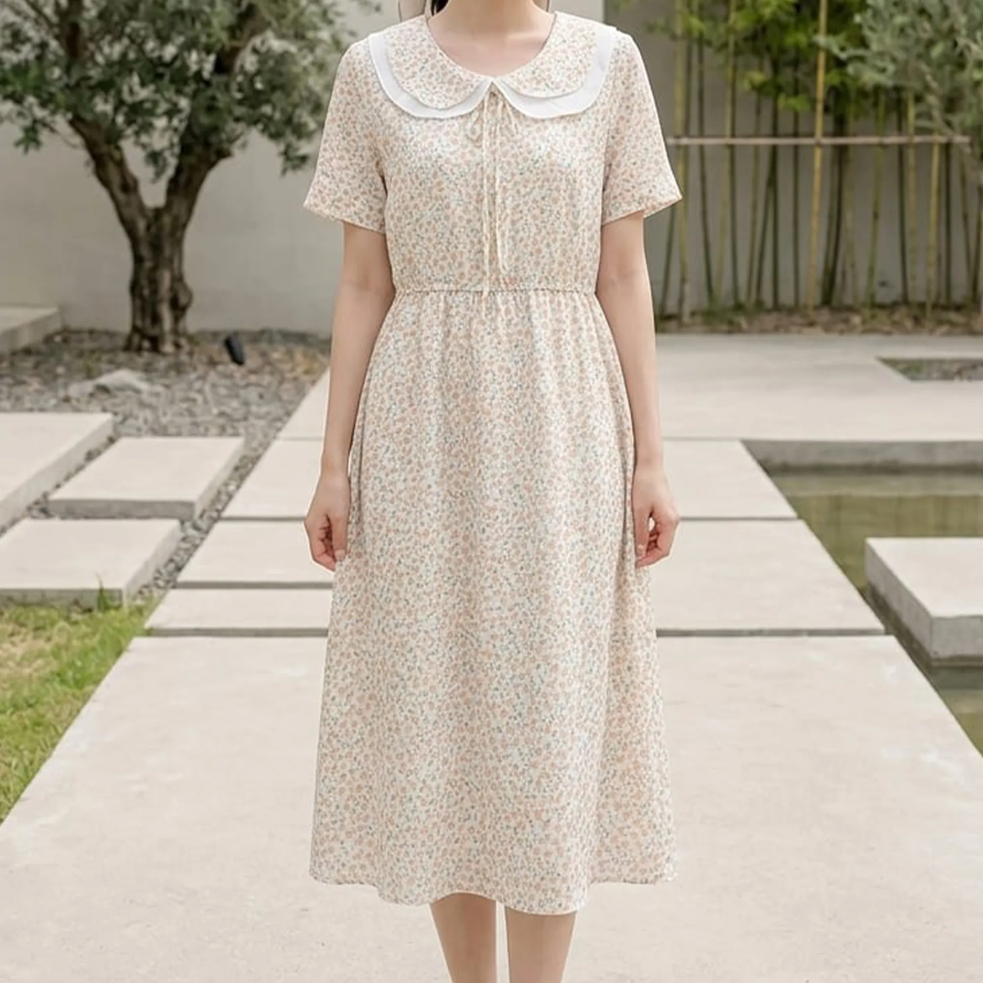 Cream-floral-midi-dress-with-white-peter-pan-collar-and-short-sleeves