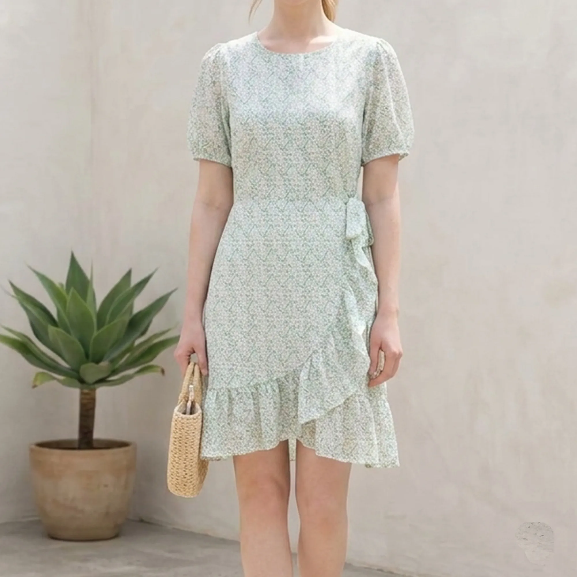 Mint-green-floral-mini-dress-with-puff-sleeves-and-ruffle-hem