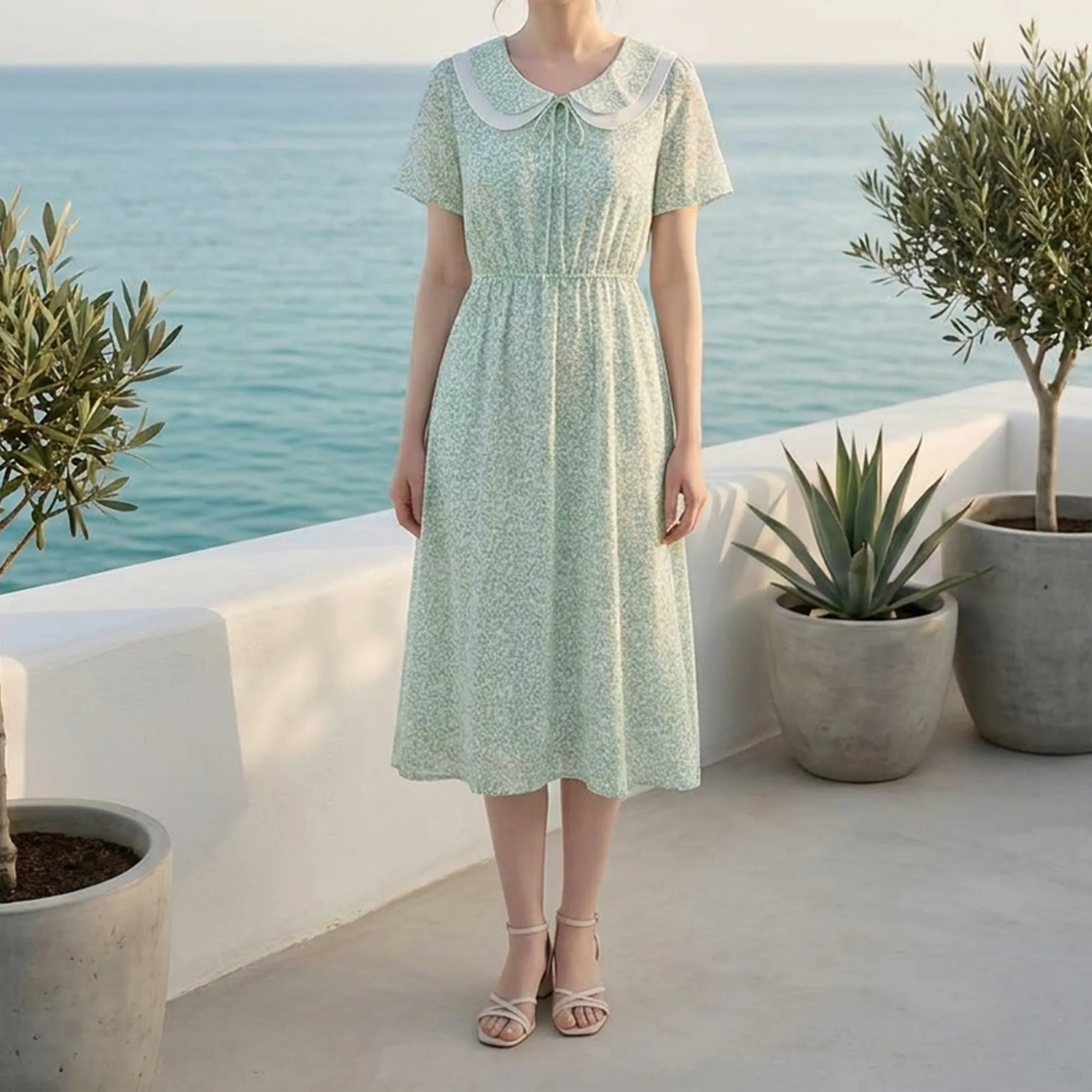 Mint-green-floral-midi-dress-for-women-with-peter-pan-collar-and-tie-front-detail