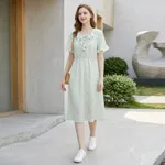 Pastel-floral-midi-dress-for-women-with-ruffle-collar-tie-front-and-short-ruffle-sleeves