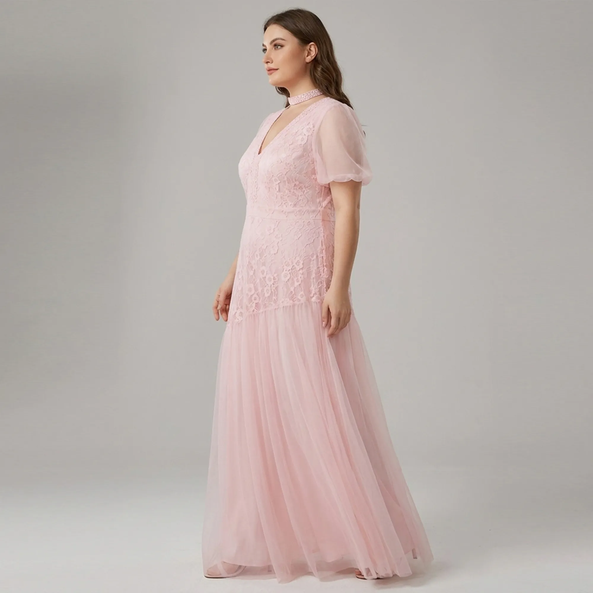Light-pink-lace-maxi-dress-for-women-with-sheer-puff-sleeves-and-flowing-skirt