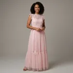 Pink-lace-maxi-dress-back-view-with-ribbon-waist-bow-and-tiered-tulle-skirt
