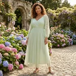 Mint-green-lace-maxi-dress-for-women-with-pleated-skirt-and-sheer-lace-sleeves