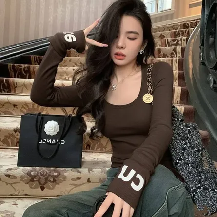 Chic "Cn" Ribbed Knit Long-Sleeve Sweater with Wrist Cuff Branding - Image 6