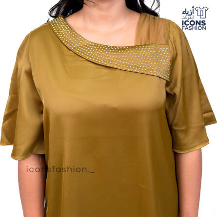 Mustard-yellow-satin-top-with-asymmetrical-mesh-and-embellished-detailing-near-the-neckline