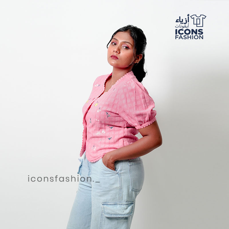 Baby-pink-short-sleeve-embroidered-top-with-scalloped-edges-and-delicate-floral-patterns