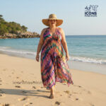 Multicolor-printed-sleeveless-halter-neck-maxi-dress-for-women-with-flowy-silhouette-worn-at-the-beach