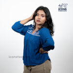 Woman-navy-blue-3/4-sleeve-embroidered-boho-top-with-v-neck-and-relaxed-fit