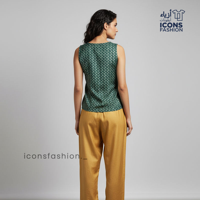 Women-green-sleeveless-embellished-top-with-gold-detailed-round-neckline