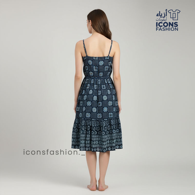 Woman-navy-blue-printed-sleeveless-fit-and-flare-midi-dress-with-scoop-neck-and-flared-hem