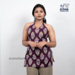 Woman-purple-printed-sleeveless-halter-neck-kurta-with-straight-silhouette