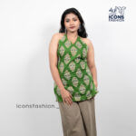 Woman-green-paisley-printed-sleeveless-halter-neck-kurta-with-open-back-and-tie-up-detail