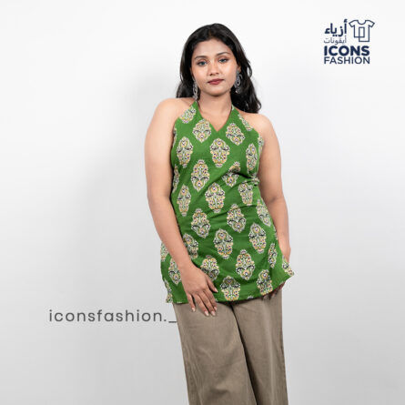 Woman-green-paisley-printed-sleeveless-halter-neck-kurta-with-open-back-and-tie-up-detail