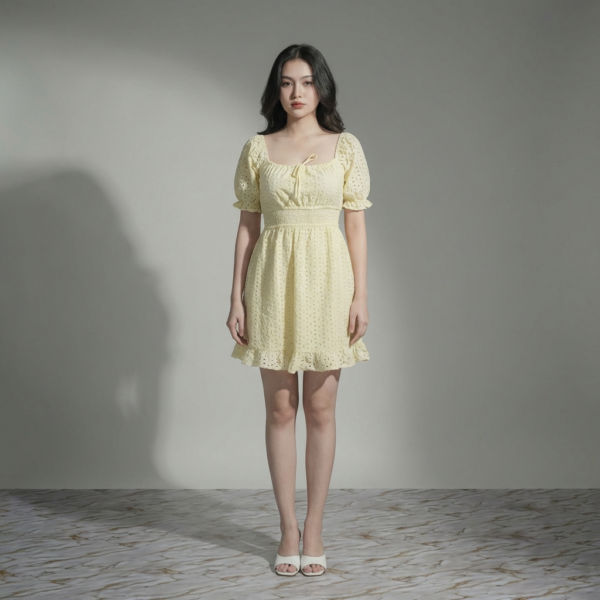 Women-yellow-eyelet-mini-dress-with-square-neck-puff-sleeves-smocked-waist-and-fit-and-flare-silhouette