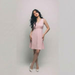 Women-pink-sleeveless-v-neck-fit-and-flare-mini-dress-with-button-detail-and-back-cut-out