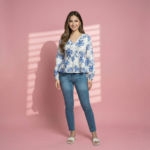 Blue-floral-print-V-neck-peplum-top-with-long-sleeves