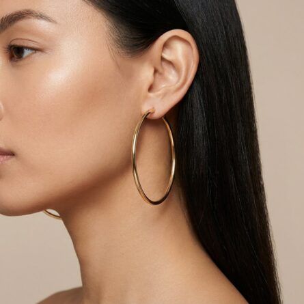 Women’s-gold-tone hoop earrings with minimalist thin circular design and latch-back closure