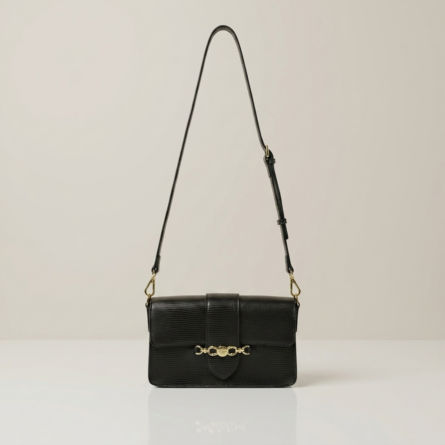 Black-structured-flap-shoulder-bag-with-gold-hardware-and-adjustable-crossbody-strap