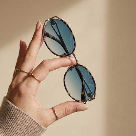 Women’s-tortoiseshell-oval-sunglasses-with-blue-gradient-tinted-lenses