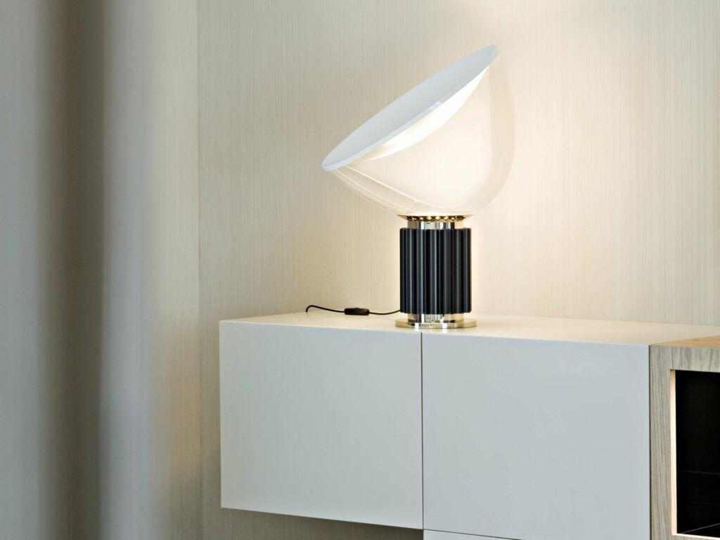 Taccia is a floor lamp designed by Achille Castiglioni and offered by Peverelli
