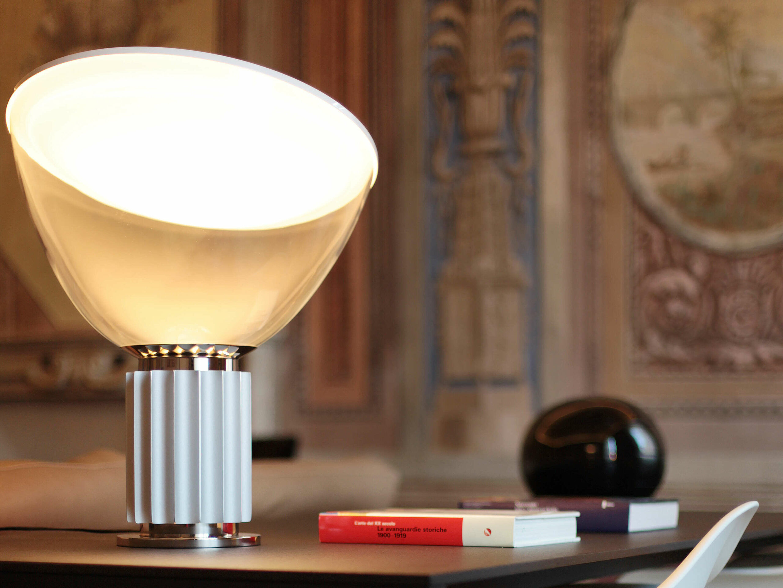 Taccia is a floor lamp designed by Achille Castiglioni and offered by Peverelli